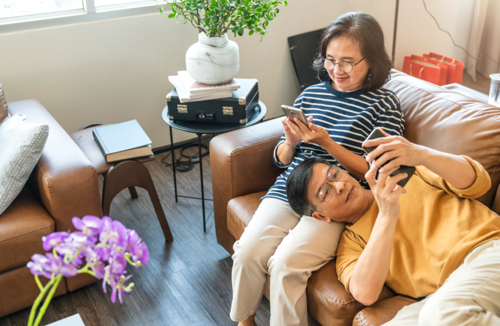 parents, moms and dads on leather sofa
