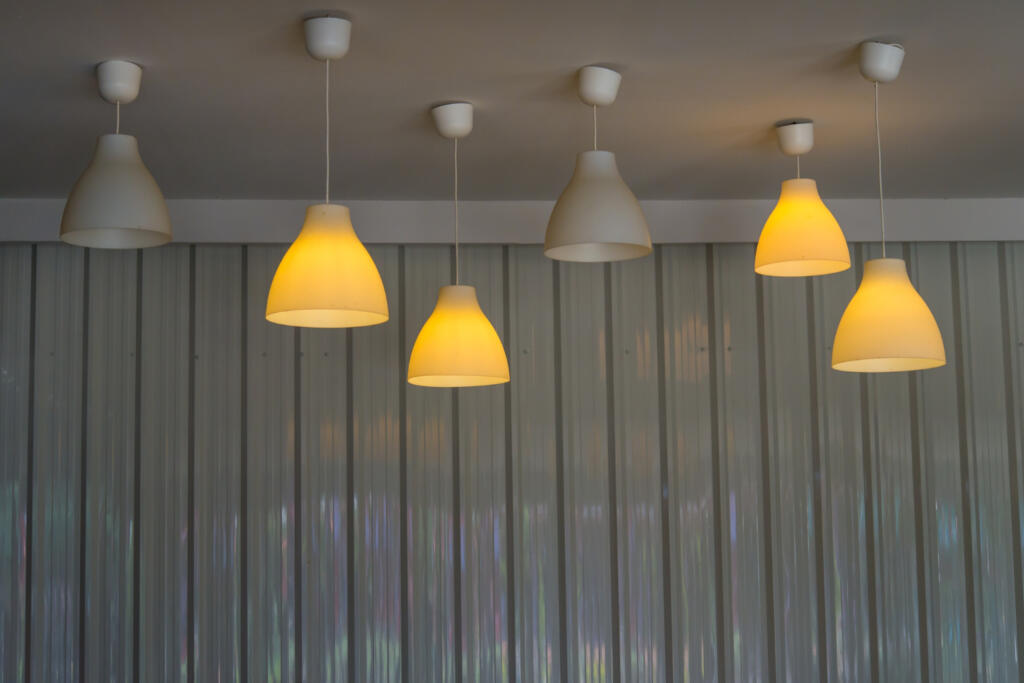 Add string lights or a ceiling light with warm bulbs for a soft glow.